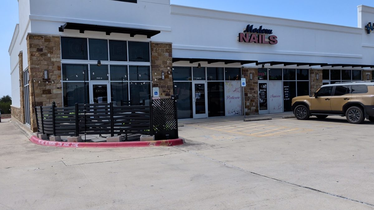 End-cap restaurant space at Southwest Center with storefront glazing
